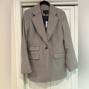 Banana Republic 100% plaid wool blazer. Never worn, with tags. Size 10.